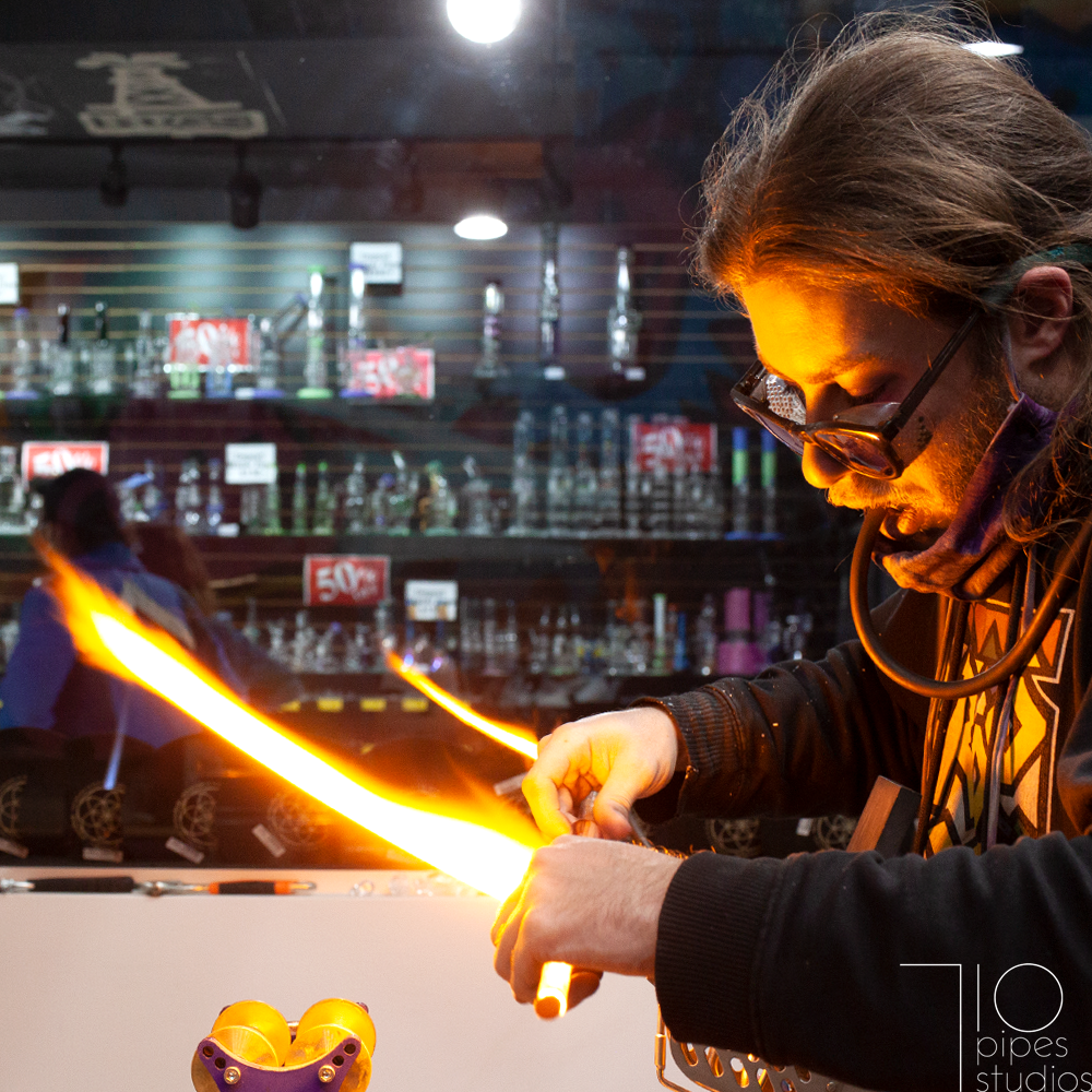 Glassblowing Artist using a torch