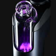 Dr. Dabber Switch GO portable vaporizer with a clear glass bubbler and LED lighting