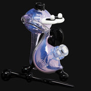 710 Pipes Smoke Shop Lee Machine Yoshi Recycler rig in iridescent blue and pink glass with black accents and a matching dabber.