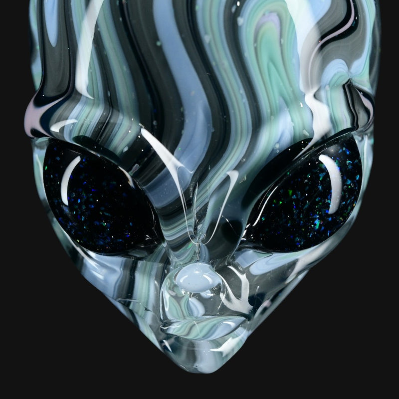 710 Pipes Smoke Shop Ghost Glass alien head pendant with blue and white swirl switchback glass and dark opal eyes.