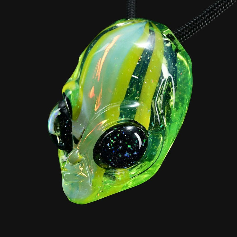 710 Pipes Smoke Shop Ghost Glass alien head pendant with green striped glass and shimmering moon opal eye detail.