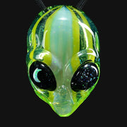 710 Pipes Smoke Shop Ghost Glass alien head pendant with green striped glass and a moon opal eye inlay.