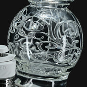Avant-Garde Deco Orb Fila Peak Top #2 by 710 Pipes Smoke Shop, featuring intricate clear glass filigree and orb design.