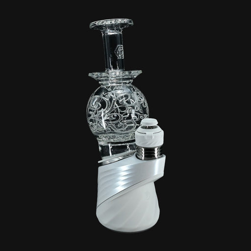 Avant-Garde Deco Orb Fila Peak Top #2 on a white Puffco Peak, featuring intricate glass filigree and Membrane Tech.