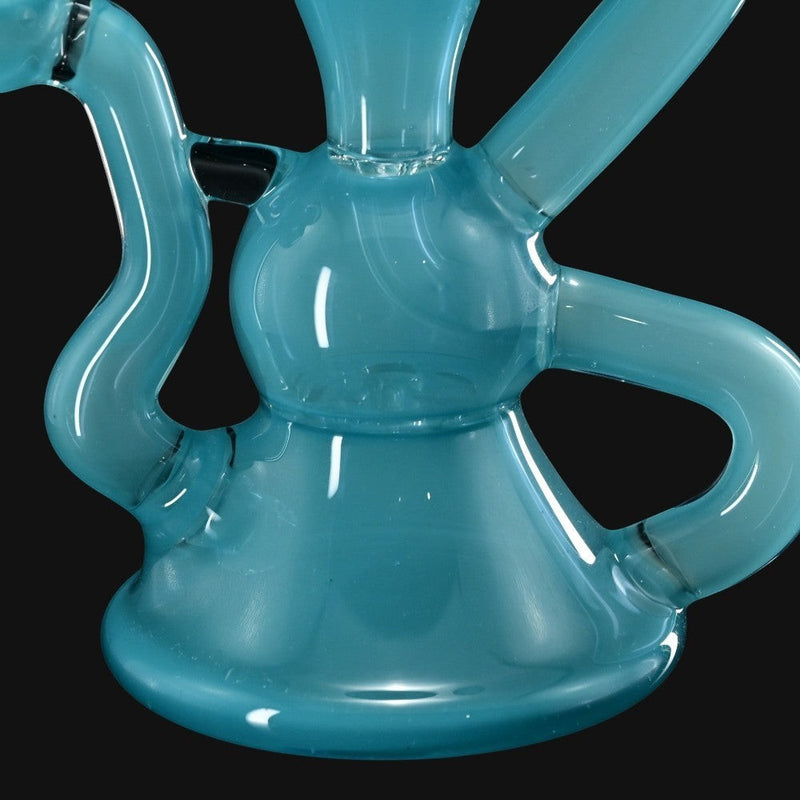 710 Pipes Smoke Shop 7-inch Blob Glass Recycler in Really Teally blue with a 10mm joint.