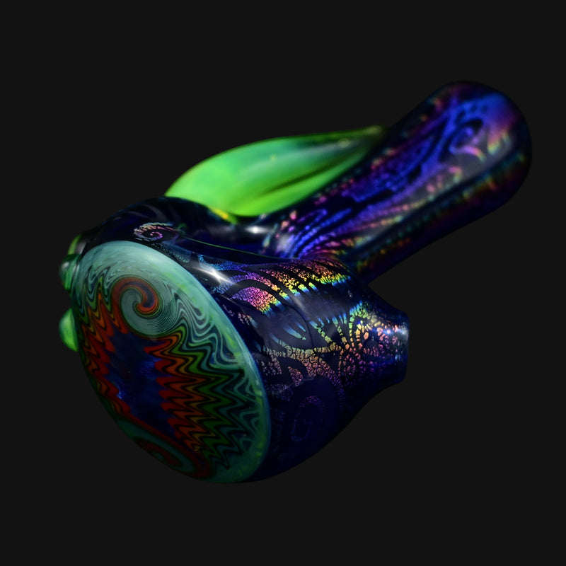 710 Pipes Smoke Shop Blossom Dichro Spoon with green accents and colorful dichroic glass patterns.