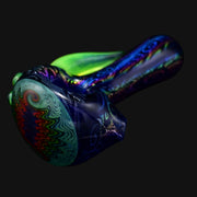 710 Pipes Smoke Shop Blossom Dichro Spoon pipe with green accents and colorful swirl design on bowl.