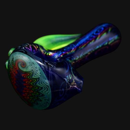 710 Pipes Smoke Shop Blossom Dichro Spoon pipe with green accents and colorful swirl design on bowl.