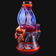 710 Pipes Smoke Shop Blossom Rig: Pink glass water pipe with blue flame accents and an orange flower.