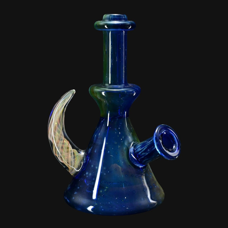 710 Pipes Smoke Shop Brando 10mm Space Rig glass water pipe with blue speckled design and unique curved handle.