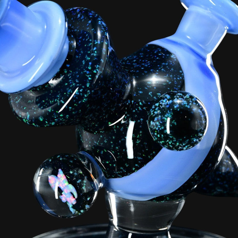 710 Pipes Smoke Shop Cajun Glass X Marni420 Heliosphere dab rig with blue satin opal accents and a rocket ship design.