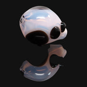 710 Pipes Smoke Shop pearlescent white cartoon character glass water pipe with black accents and mouthpiece.