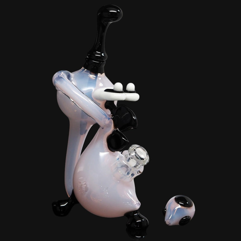 710 Pipes Smoke Shop pearlescent white cartoon character glass water pipe with black accents and mouthpiece.