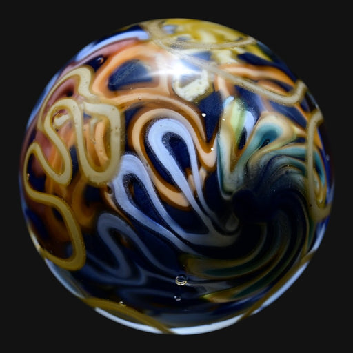 710 Pipes Smoke Shop Charisma glass marble featuring swirling patterns of blue, orange, and white glass.