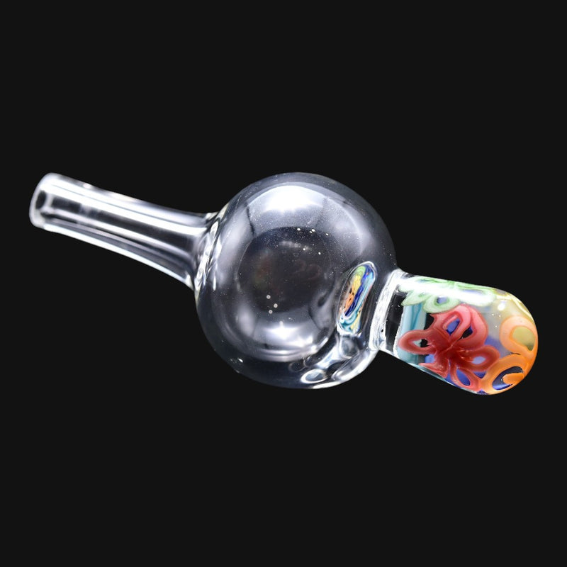 710 Pipes Smoke Shop clear glass bubble cap with a colorful floral pattern handle for dab rigs