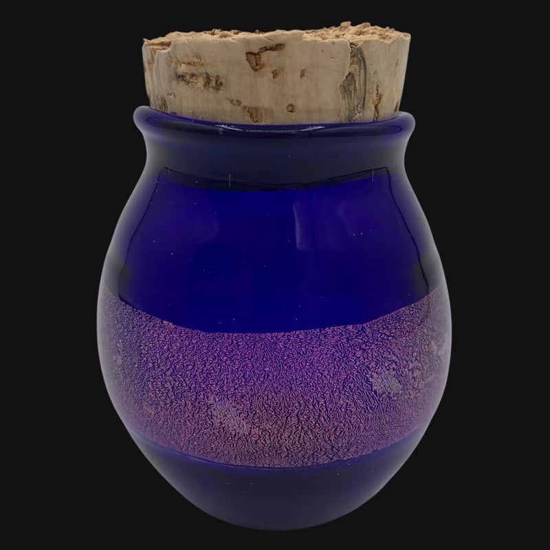710 Pipes Smoke Shop Korry Antos cobalt blue glass stash jar with a textured purple band and natural cork stopper.