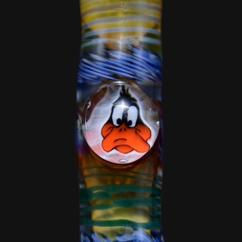 710 Pipes Smoke Shop Matty White Carnival glass one hitter pipe featuring a Daffy Duck character marble design