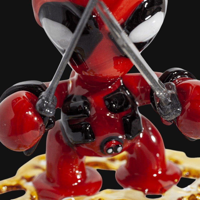 710 Pipes Smoke Shop Dani Girl Glass Deadpool dab rig with removable swords. Red and black glass.