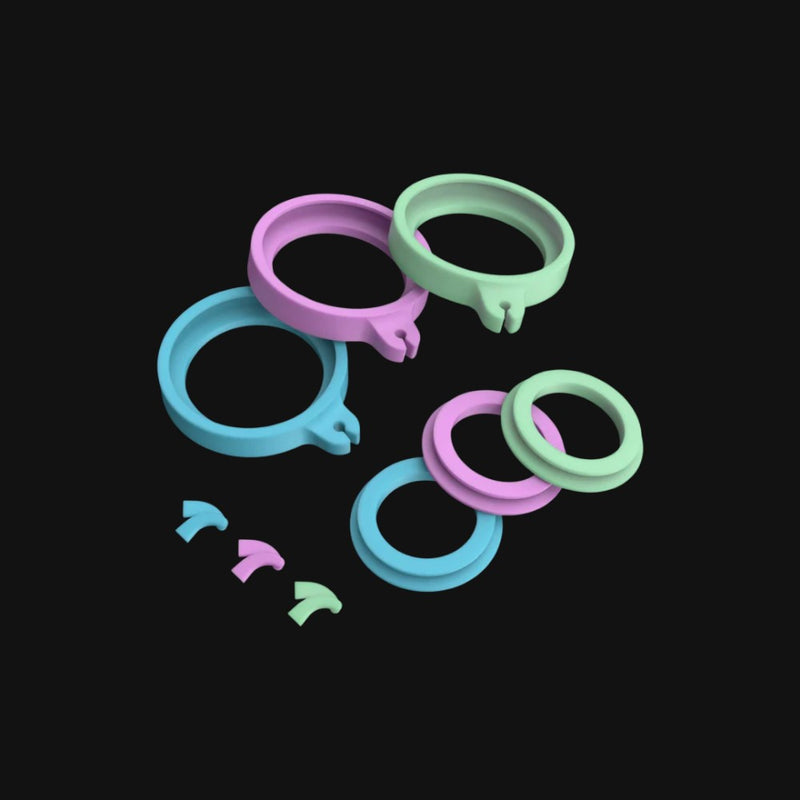 710 Pipes Smoke Shop Dr. Dabber Switch silicone accessory pack in pastel blue, pink, and green rings and caps.