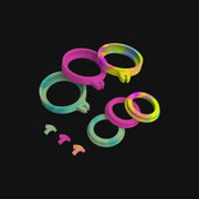 710 Pipes Smoke Shop Dr. Dabber Switch silicone accessory pack featuring colorful rings and small plugs.