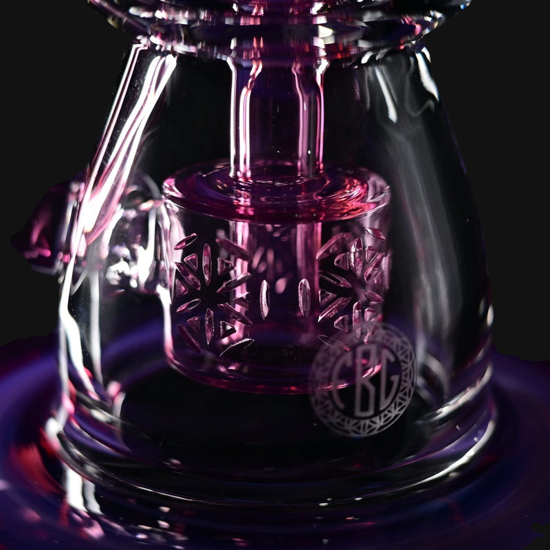 710 Pipes Smoke Shop Fat Boy Torus glass water pipe with 14mm joint and intricate starburst engravings in royal jelly purple.