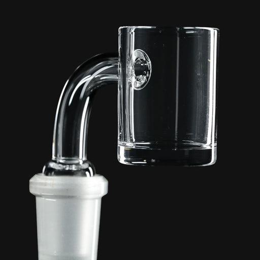 710 Pipes Smoke Shop clear flat-top quartz banger for dabbing with a thick glass joint on a black background.