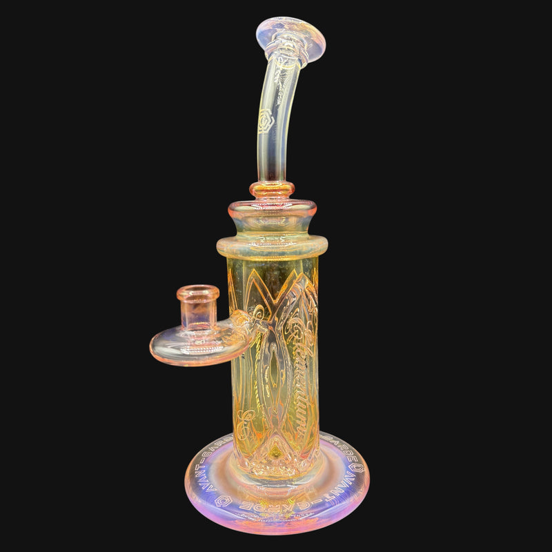 710 Pipes Smoke Shop Avant-Garde fumed glass columnar dab rig with intricate etched designs and a curved mouthpiece.