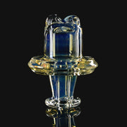 710 Pipes Smoke Shop fumed glass Restricted Switch 2 spinner cap with a unique iridescent finish on black background.