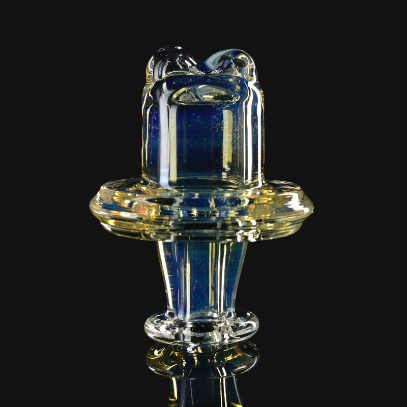 710 Pipes Smoke Shop fumed glass Restricted Switch 2 spinner cap with a unique iridescent finish on black background.