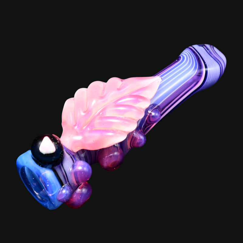 710 Pipes Smoke Shop glass pipe with pink leaf accent, purple and blue swirl design, and marble bowl.