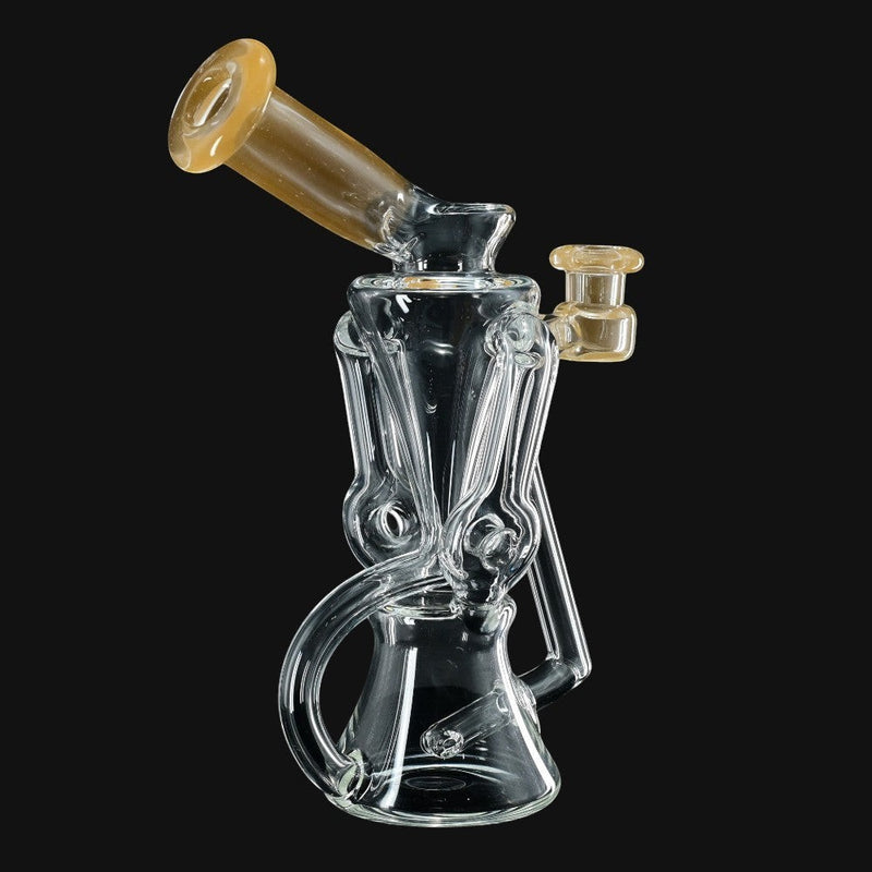 710 Pipes Smoke Shop clear borosilicate glass recycler water pipe with tan accents and angled mouthpiece.