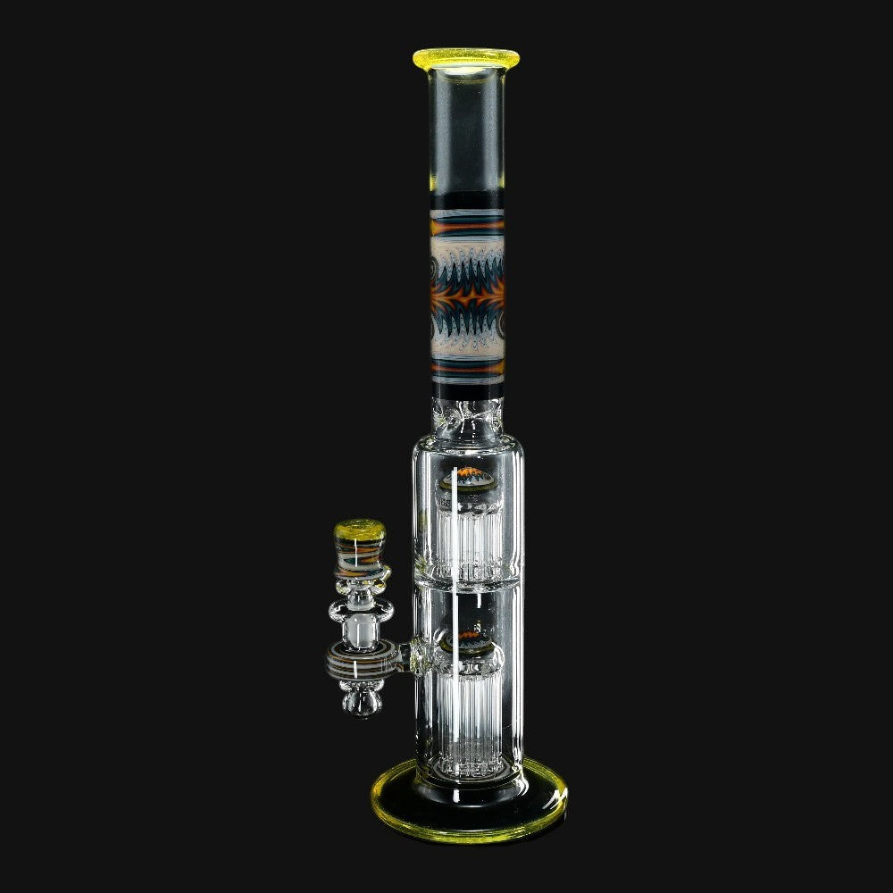 710 Pipes Smoke Shop yellow, orange, and blue wigwag glass water pipe with two tree perc chambers.