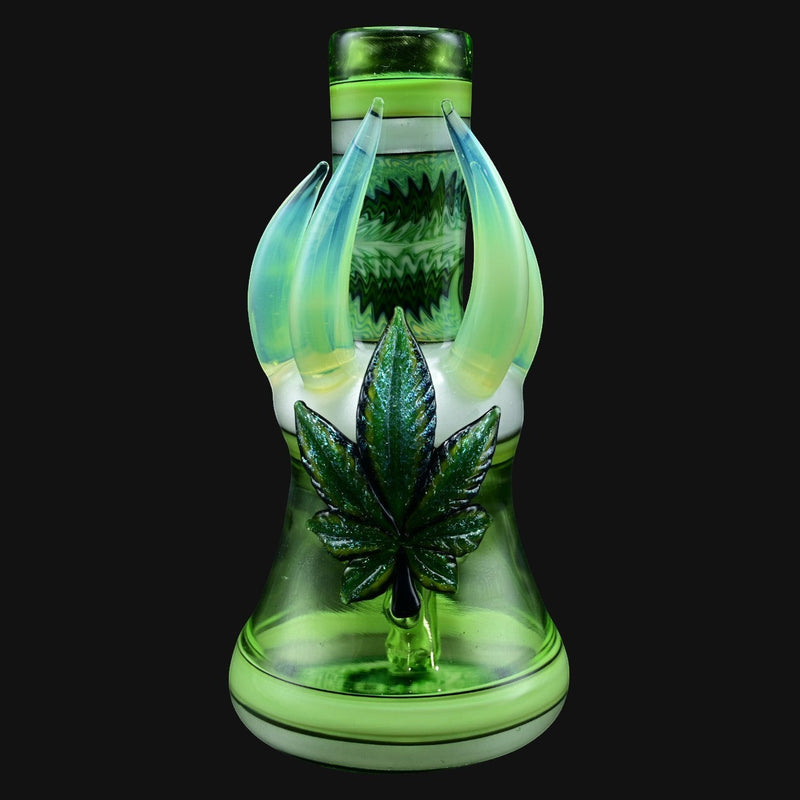 710 Pipes Smoke Shop green glass bong with iridescent leaf accent and claw-like protrusions.