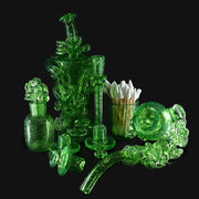 710 Pipes Smoke Shop transparent green glass 7-piece dab set with recycler, sherlock, spinner caps, ISO jar, and q-tip holder.
