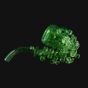 710 Pipes Smoke Shop transparent green glass pipe with gold dichro and coral-style attachments. Features a unique design with intricate glasswork.