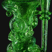 710 Pipes Smoke Shop transparent green glass recycler with gold dichro and coral-style attachments.