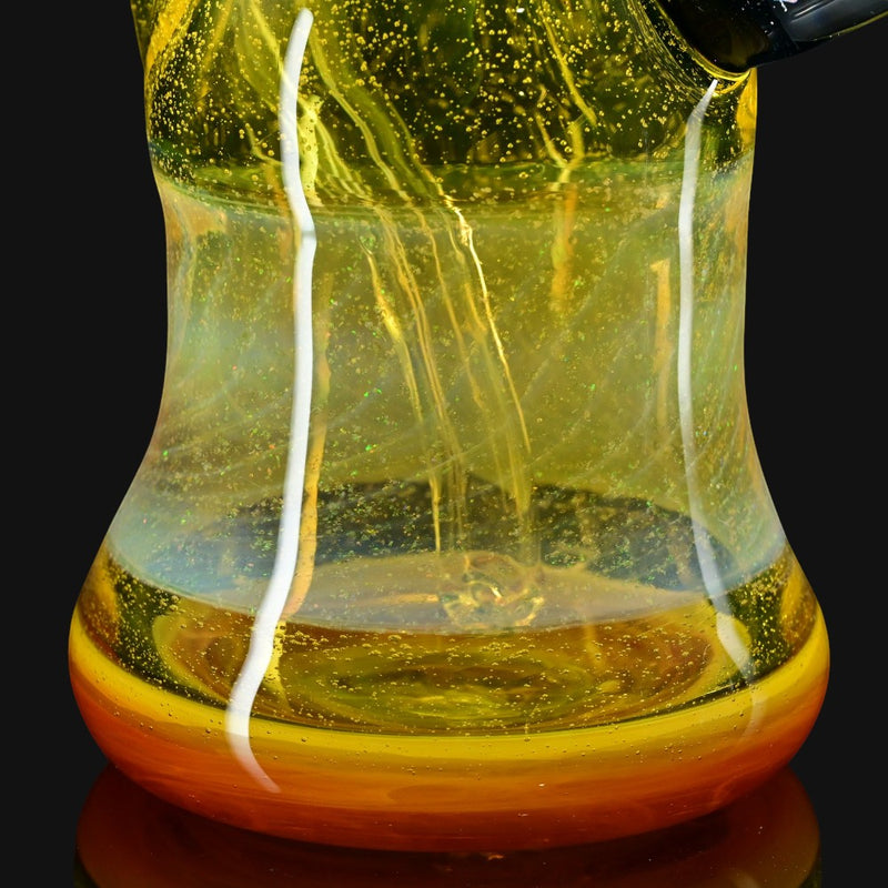 710 Pipes Smoke Shop HeavyDirty Terps Donut Rig with yellow glass, donut mouthpiece, and 2-hole downstem.