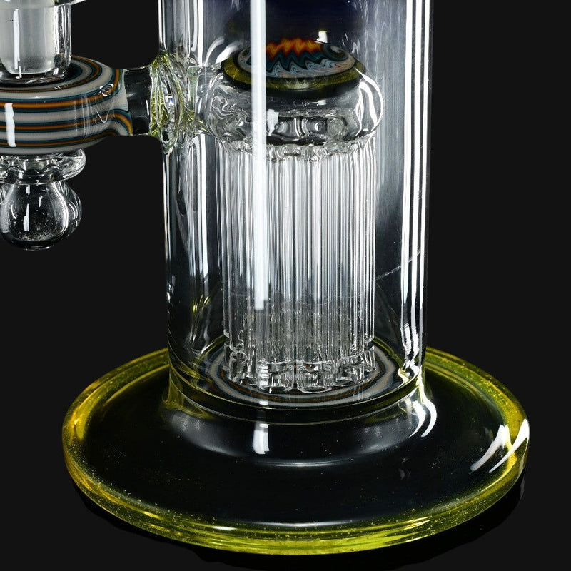 710 Pipes Smoke Shop Hedman Fully Worked Tube with yellow, orange, and blue WigWags. Features two tree perc chambers and a 14mm joint.