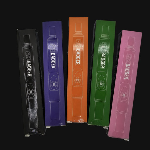 710 Pipes Smoke Shop Huni Badger Mini portable dab device boxes in black, purple, orange, green, and pink colors.