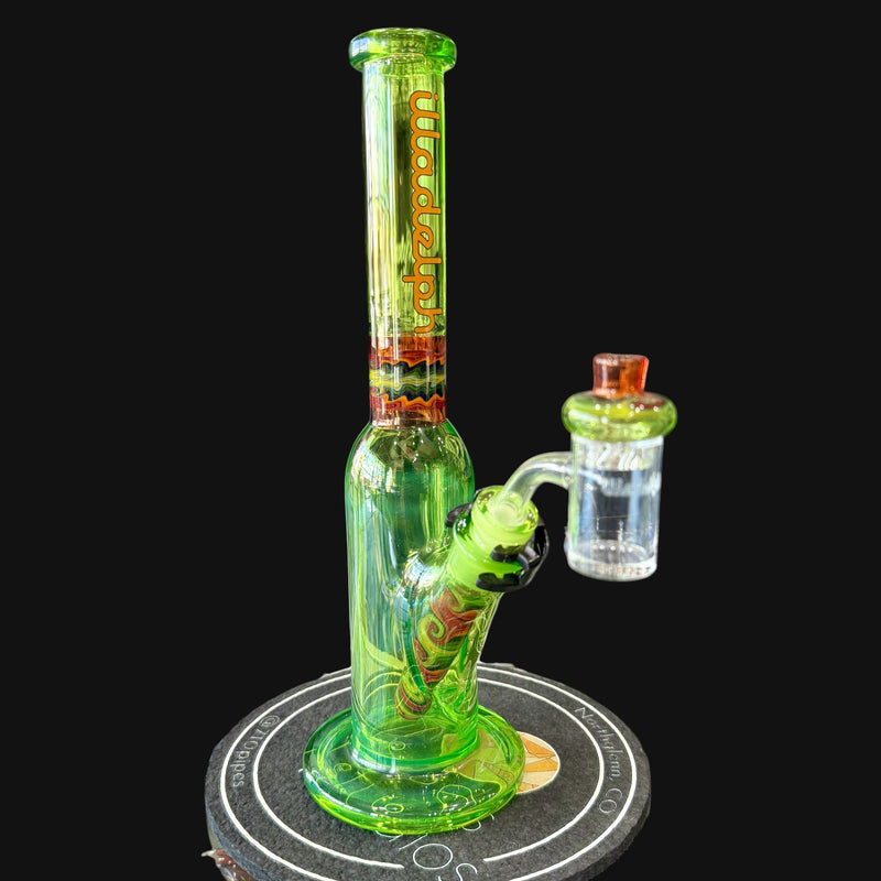 710 Pipes Smoke Shop Illadelph Custom Tube glass bong with lime green body, orange accents, and wig wag design.