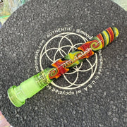 710 Pipes Smoke Shop Illadelph Custom Tube WigWag with lime green accents and vibrant orange, yellow, and red swirls.