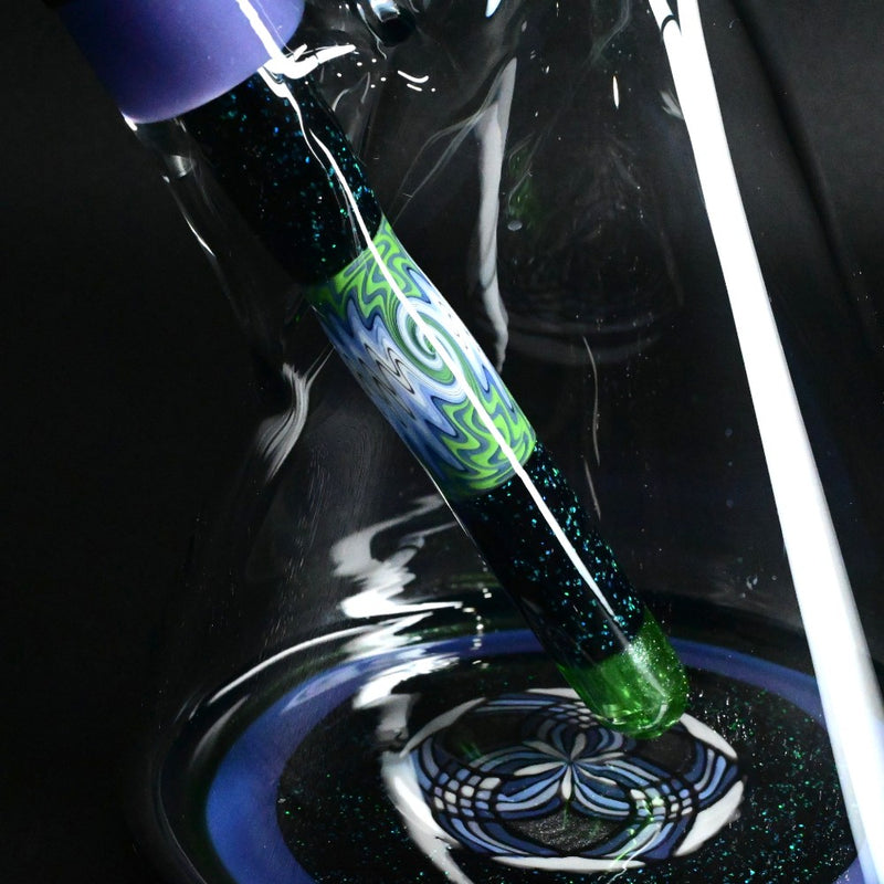 710 Pipes Smoke Shop Illadelph custom glass beaker bong with green and purple wigwag patterns and glitter accents