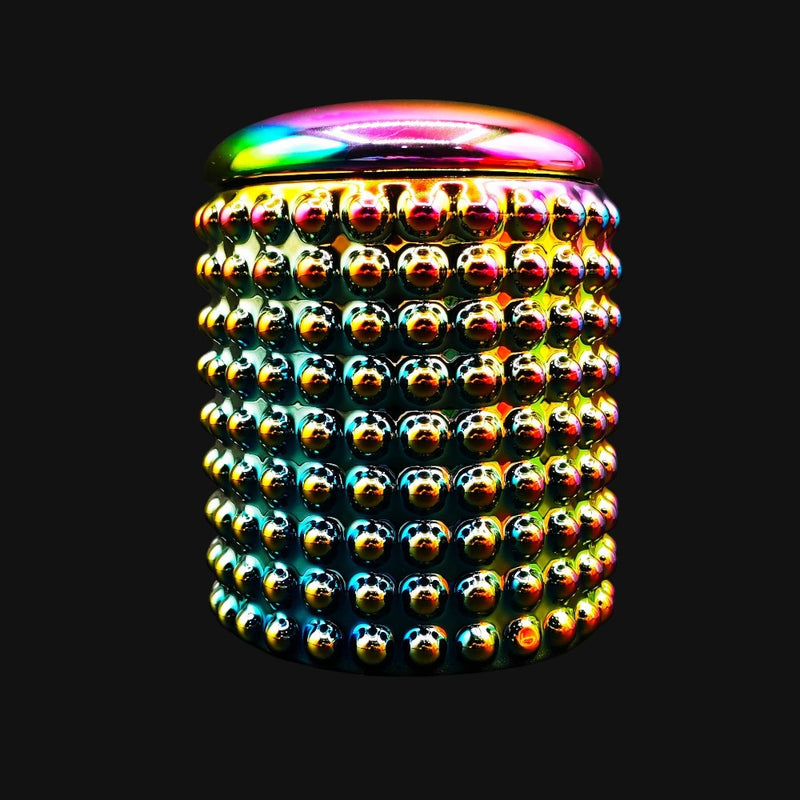710 Pipes Smoke Shop Spectrum Dotted Ceramic Stash Jar with a vibrant iridescent rainbow finish and textured dots.