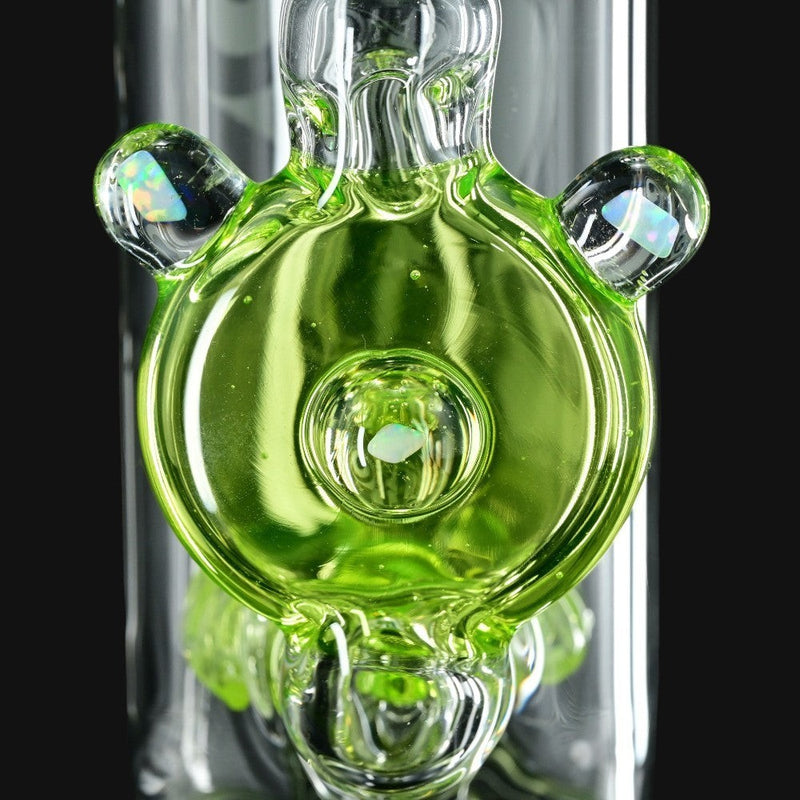 710 Pipes Smoke Shop Joel Halen Illuminati glass rig featuring vibrant green glass and embedded opal accents.