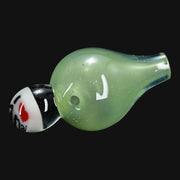 710 Pipes Smoke Shop JuneBug Profane bubble cap featuring a translucent green glass body and a decorative glass bead.