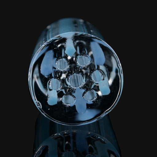 710 Pipes Smoke Shop Kadabra blue glass filter tip with a multi-hole airflow design on a black background.