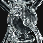 Kadabra Bubble Bhomber glass recycler rig by 710 Pipes Smoke Shop featuring multiple recycling arms for smooth draws.