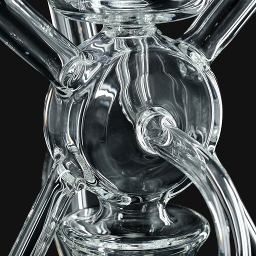 Kadabra Bubble Bhomber glass recycler rig by 710 Pipes Smoke Shop featuring multiple recycling arms for smooth draws.