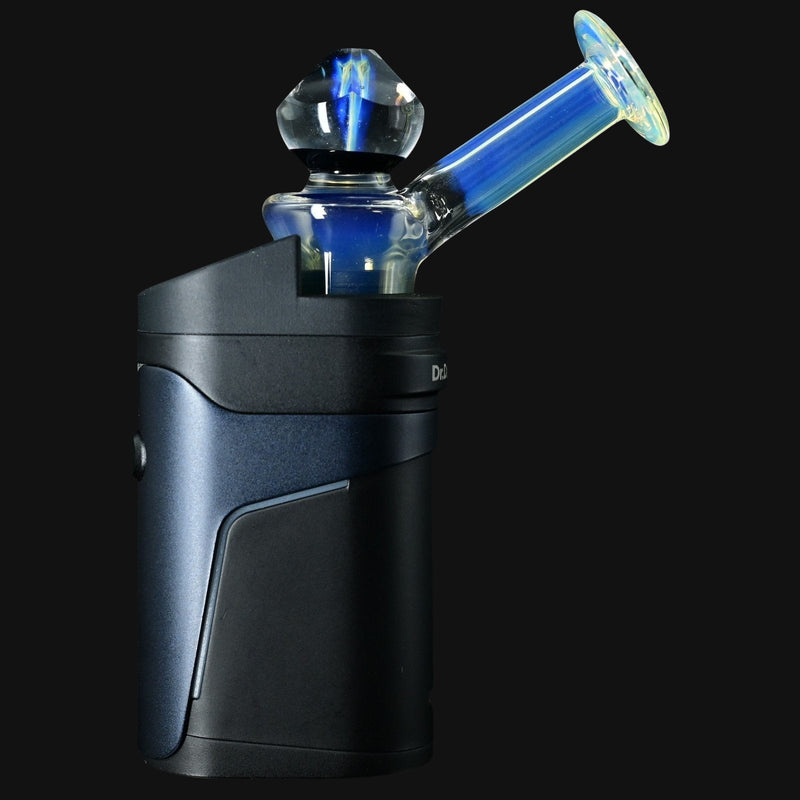 710 Pipes Smoke Shop Kadabra Gem Faceted Ghost 2 glass top attachment on a dark blue vaporizer base.
