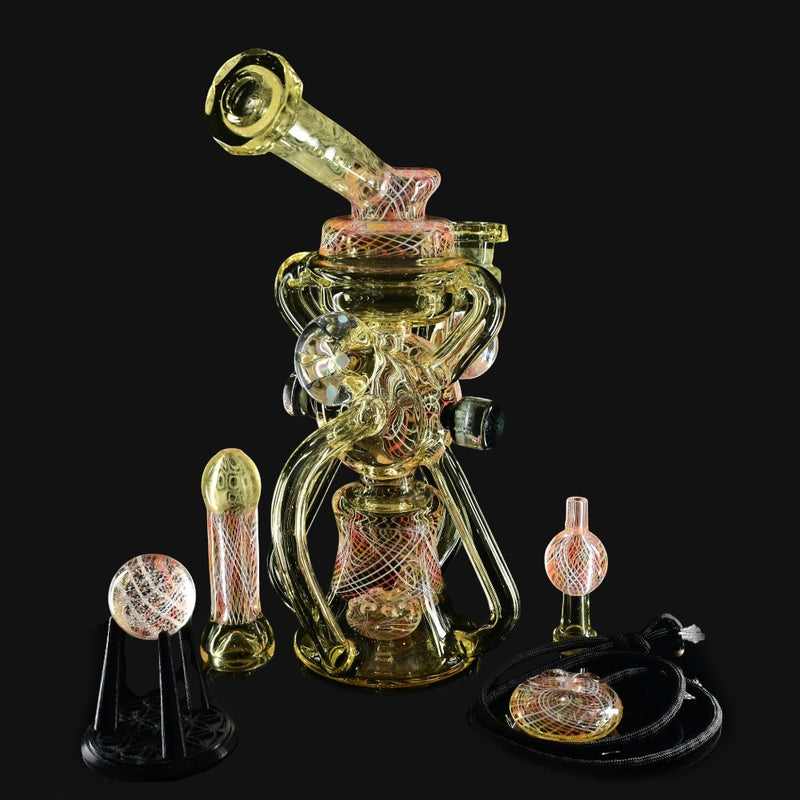 710 Pipes Smoke Shop Kadabra glass bubble bhomber set with matching cap, marble, chillum, and pendant. Yellow glass with intricate red and white line work.